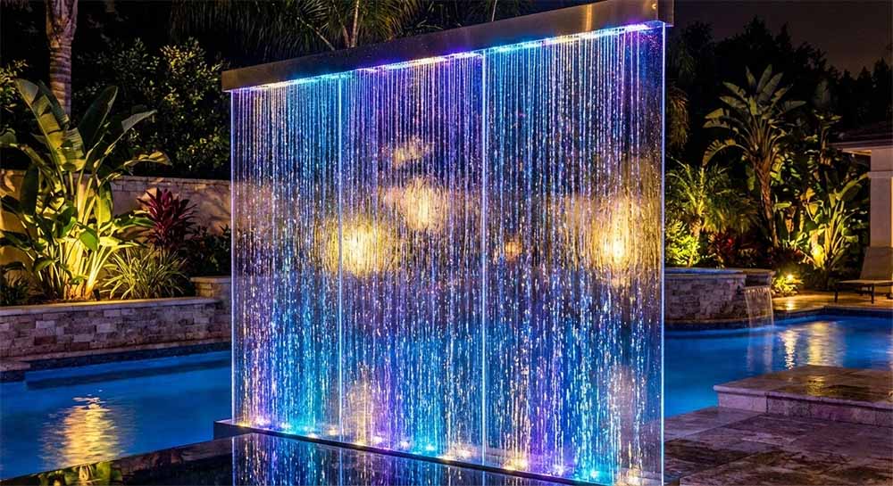 Phụ Kiện Ngoại Thất: Bạt Phủ Hồ Bơi Tự Động & Ghế Tắm Nắng 2 Thác nước màn mưa Acrylic có đèn LED phát sáng vào ban đêm, tạo không gian lung linh